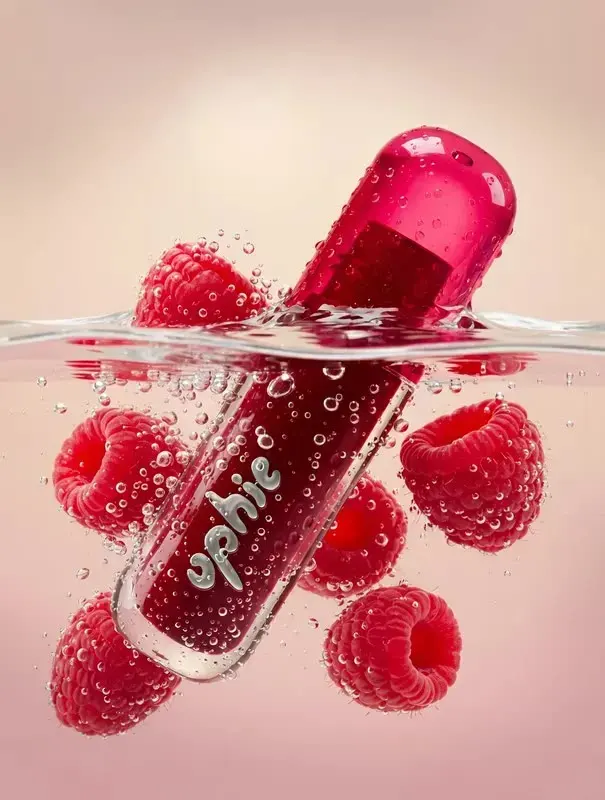 Splash template: lip gloss in water with raspberries